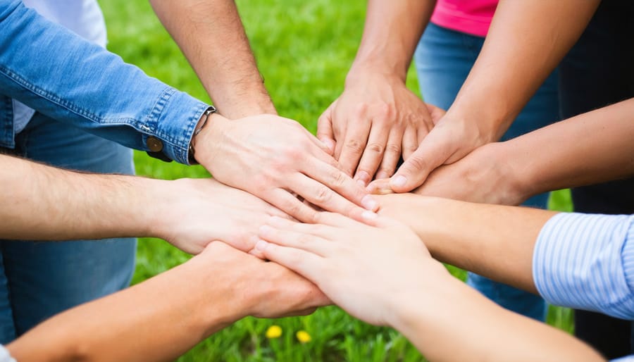 Christian support group praying together in unity